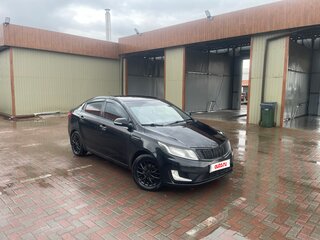 2012 Kia Rio 5-speed III, чёрный, 710000 рублей, вид 2