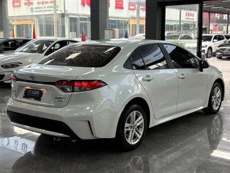 2025 Toyota Corolla XII (E210), белый, 1899000 рублей, вид 4