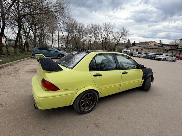 2001 Mitsubishi Lancer IX, жёлтый, 170000 рублей - вид 10