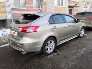 2008 Mitsubishi Lancer X, золотистый, 900000 рублей, вид 2