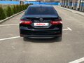 2020 Toyota Camry VIII (XV70), чёрный, 2590000 рублей - вид 7