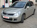 2011 Nissan Tiida I Рестайлинг, коричневый, 360000 рублей - вид 1
