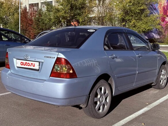 2004 Toyota Corolla IX (E120, E130) Рестайлинг, голубой - вид 3