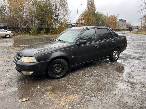 2011 Daewoo Nexia I Рестайлинг, чёрный, 150000 рублей - вид 2