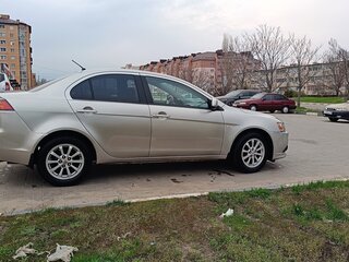 2012 Mitsubishi Lancer X Рестайлинг, серебристый, 780000 рублей, вид 4