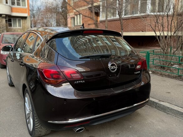 2014 Opel Astra J Рестайлинг, коричневый, 1360000 рублей - вид 11