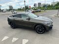 2020 BMW X6 40i III (G06), зелёный, 5830000 рублей - вид 3