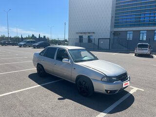 2012 Daewoo Nexia I Рестайлинг, серебристый, 125000 рублей, вид 1