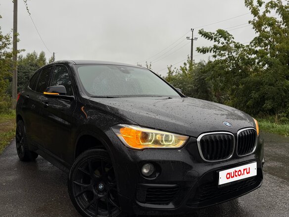 2018 BMW X1 18i sDrive II (F48), чёрный - вид 1