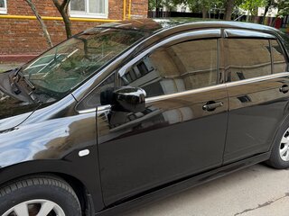 2011 Nissan Tiida I Рестайлинг, чёрный, 810000 рублей, вид 4