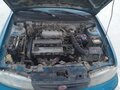 1997 Kia Sephia I Рестайлинг, синий, 99000 рублей - вид 8