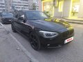 2012 BMW 1 серии 118i II (F20/F21), чёрный, 1040000 рублей