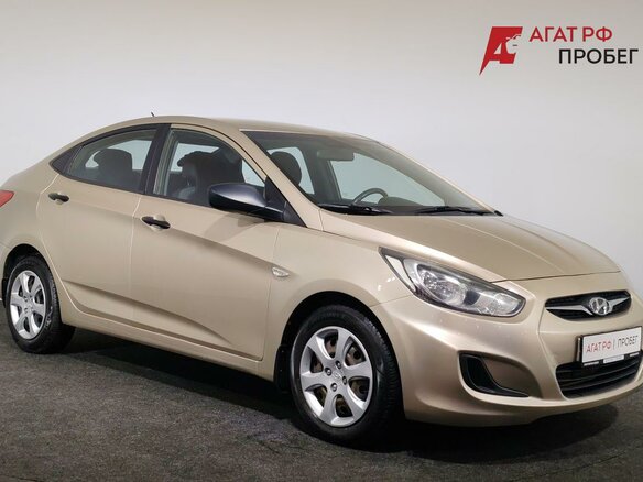 2013 Hyundai Solaris I, бежевый - вид 2