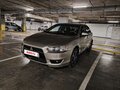 2007 Mitsubishi Lancer X, бежевый, 600000 рублей