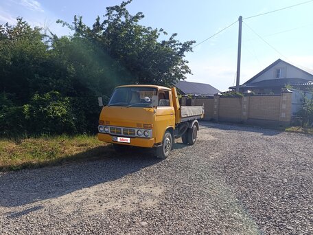 1991 Nissan Atlas, жёлтый, 1350000 рублей, вид 4