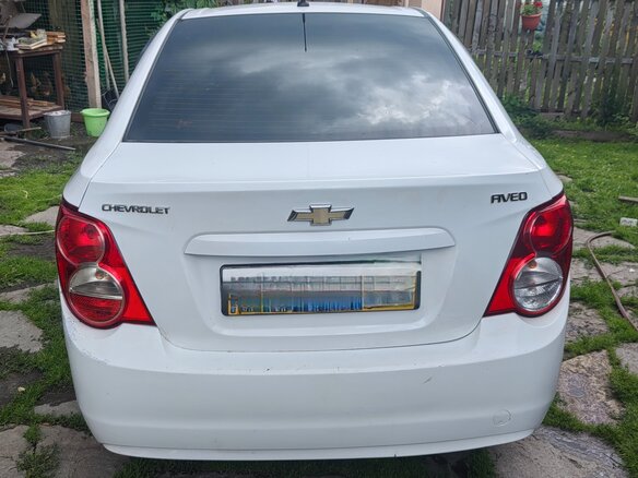 2013 Chevrolet Aveo II, белый - вид 4