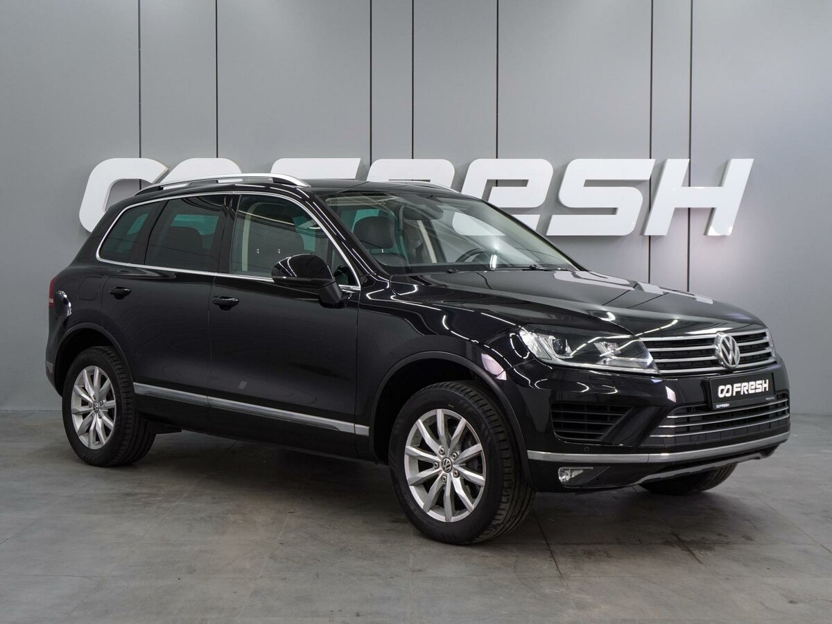 Открыть фотографии: Volkswagen Touareg II Рестайлинг