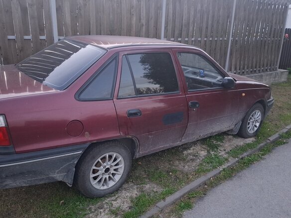 2005 Daewoo Nexia I, фиолетовый - вид 2