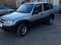 2015 Chevrolet Niva I Рестайлинг, серебристый, 500000 рублей - вид 1
