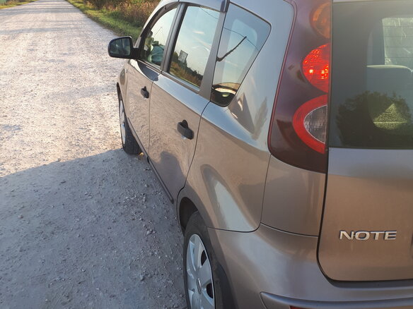 2011 Nissan Note I Рестайлинг, коричневый, 500000 рублей - вид 5