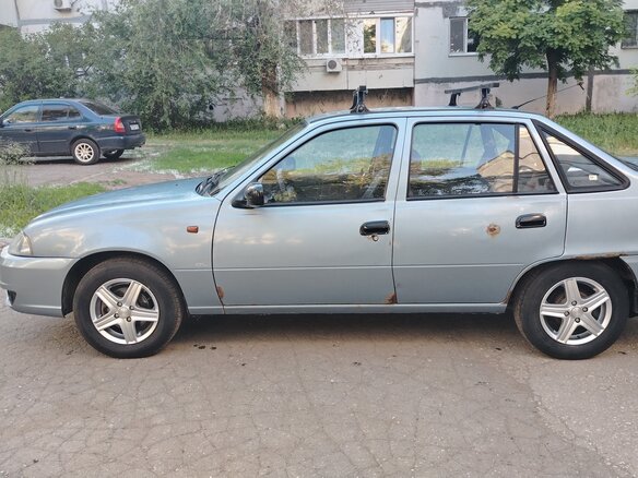 2011 Daewoo Nexia I Рестайлинг, серый, 320000 рублей - вид 2