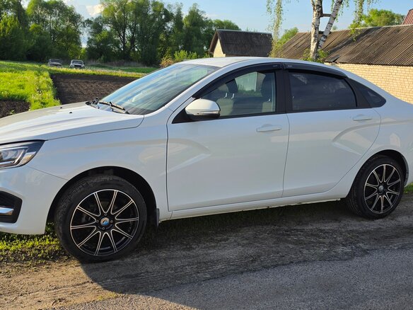 2023 Lada (ВАЗ) Vesta I Рестайлинг (NG), белый, 1260000 рублей - вид 11