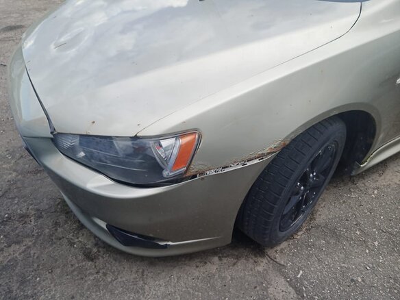 2010 Mitsubishi Lancer X, бежевый, 268000 рублей - вид 13