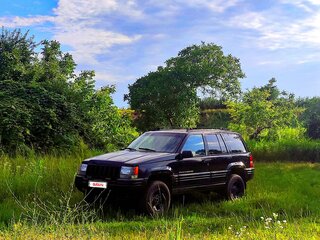 1996 Jeep Grand Cherokee I (ZJ) Рестайлинг, чёрный, 850000 рублей, вид 1