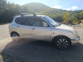 2001 Daihatsu Storia I (M100) Рестайлинг, золотистый, 370000 рублей, вид 3
