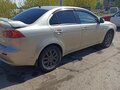 2010 Mitsubishi Lancer X, бежевый, 650000 рублей - вид 3