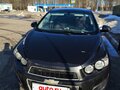 2014 Chevrolet Aveo II, чёрный, 650000 рублей