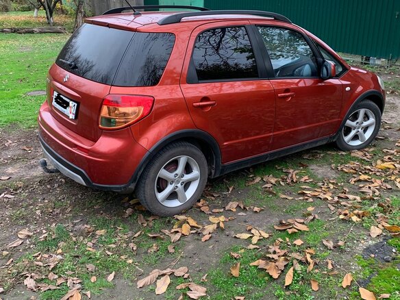 2008 Suzuki SX4 I (Classic), оранжевый, 800000 рублей - вид 2