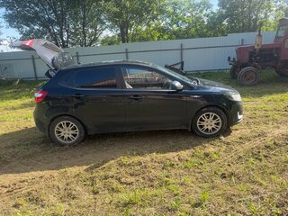2012 Kia Rio 5-speed III, чёрный, 720000 рублей, вид 2