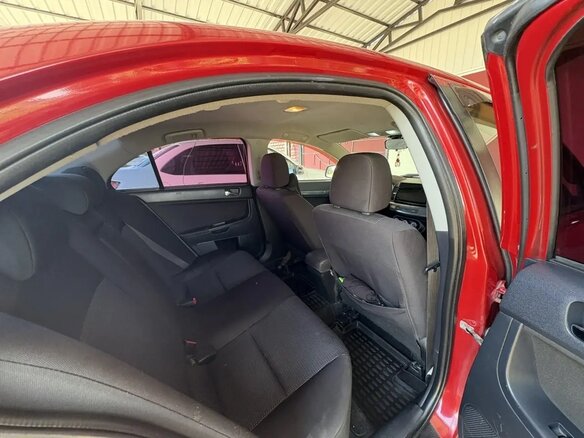 2008 Mitsubishi Lancer X, красный, 600000 рублей - вид 14