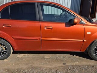 2011 Kia Rio II Рестайлинг, оранжевый, 650000 рублей, вид 5