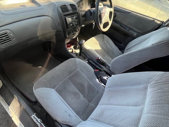 1999 Mazda Familia VIII (BJ), белый - вид 3