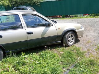 2012 Daewoo Nexia I Рестайлинг, жёлтый, 200000 рублей, вид 3