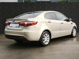 2014 Kia Rio 4-speed III, бежевый, 949000 рублей, вид 5
