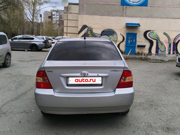 2004 Toyota Corolla IX (E120, E130), серый, 550000 рублей - вид 1
