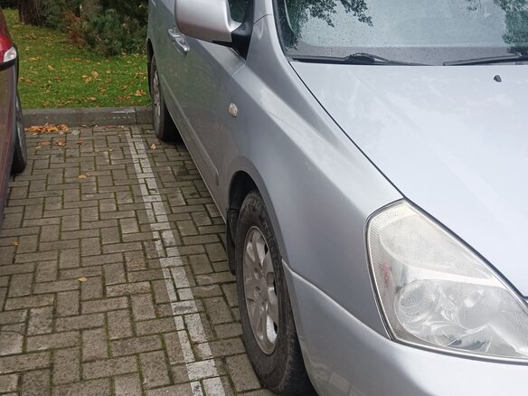 2007 Kia Carnival II, серебристый - вид 1