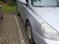 2007 Kia Carnival II, серебристый - вид 1