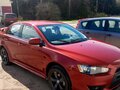 2008 Mitsubishi Lancer X, красный, 680000 рублей - вид 1