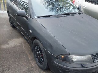 2001 Mitsubishi Carisma I Рестайлинг, чёрный, 210000 рублей, вид 1