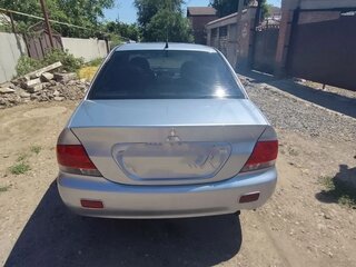2005 Mitsubishi Lancer IX Рестайлинг, серебристый, 450000 рублей, вид 4