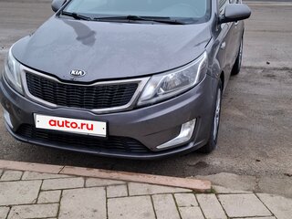 2014 Kia Rio 4-speed III, серый, 705800 рублей, вид 3