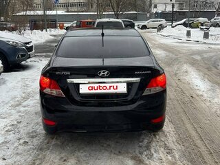 2012 Hyundai Solaris I, чёрный, 670000 рублей, вид 3