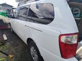 2010 Kia Carnival Grand II, белый, 1490000 рублей - вид 4