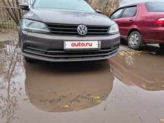 2016 Volkswagen Jetta VI Рестайлинг, коричневый, 960000 рублей, вид 2