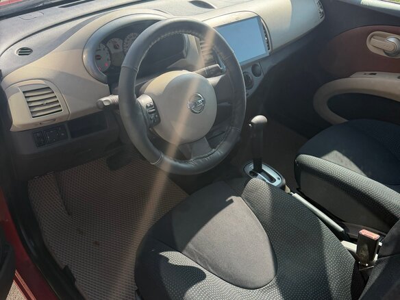 2010 Nissan Micra III (K12), пурпурный - вид 8