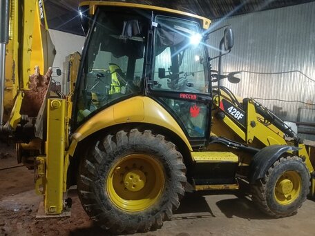 2014 Caterpillar 428, жёлтый, 5800000 рублей, вид 2